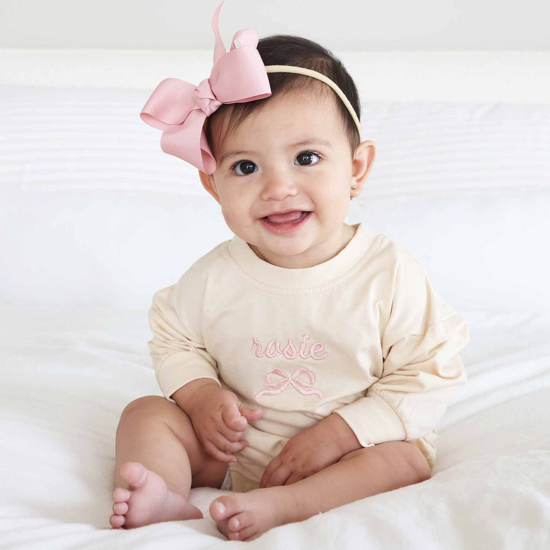 bow embroidered long sleeve bubble romper for babies 