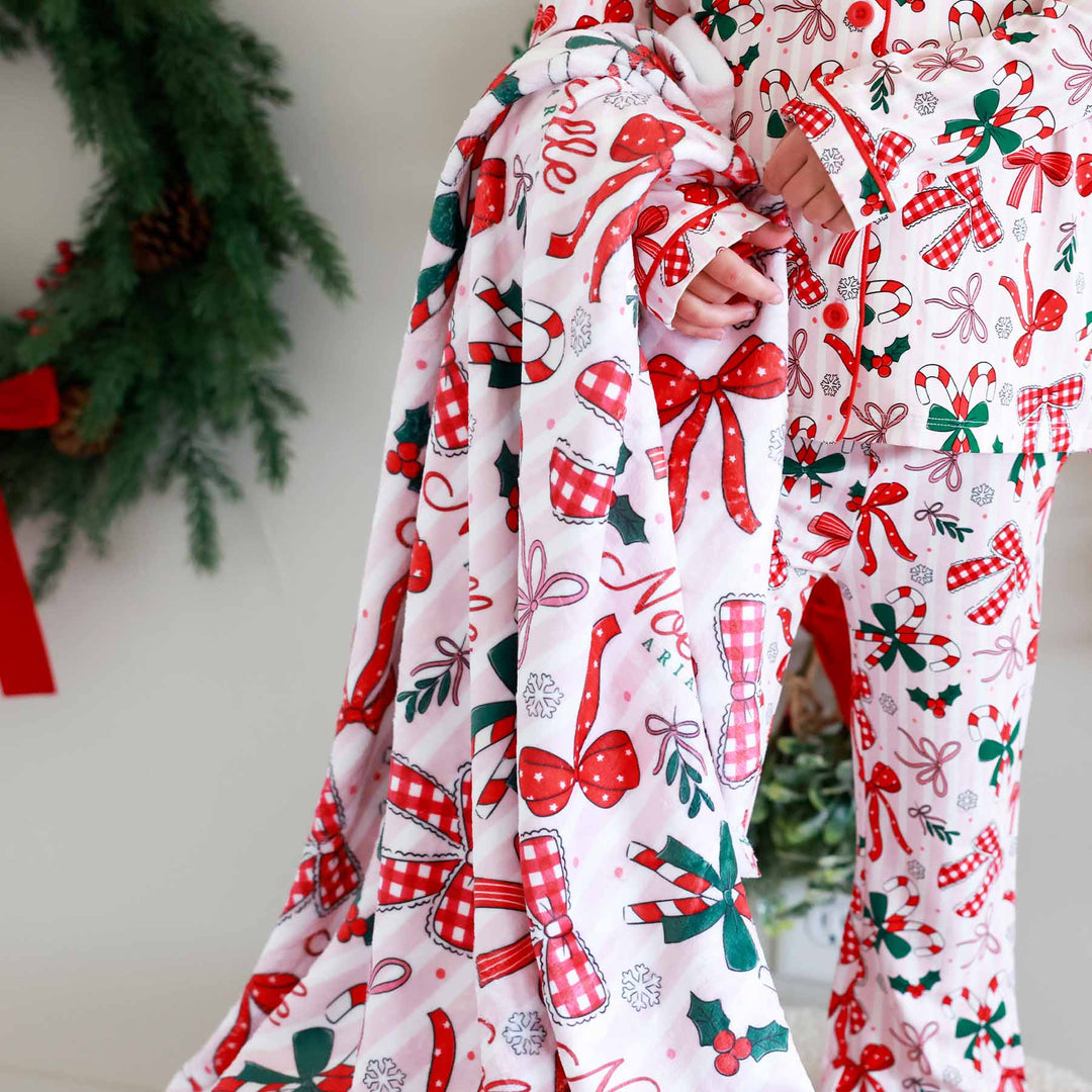 personalized minky blanket for girls with red bows for christmas with matching flare pajama lounge sets for kids