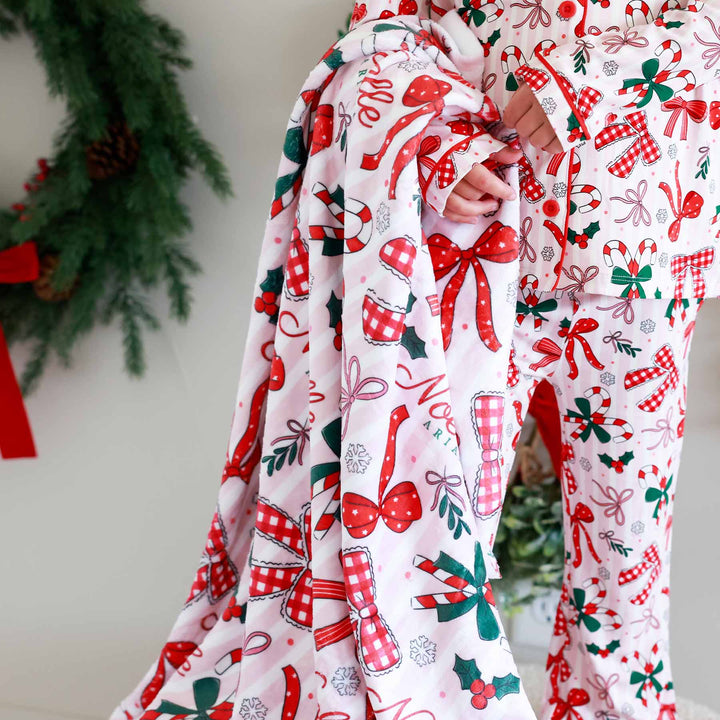 personalized minky blanket for girls with red bows for christmas with matching flare pajama lounge sets for kids