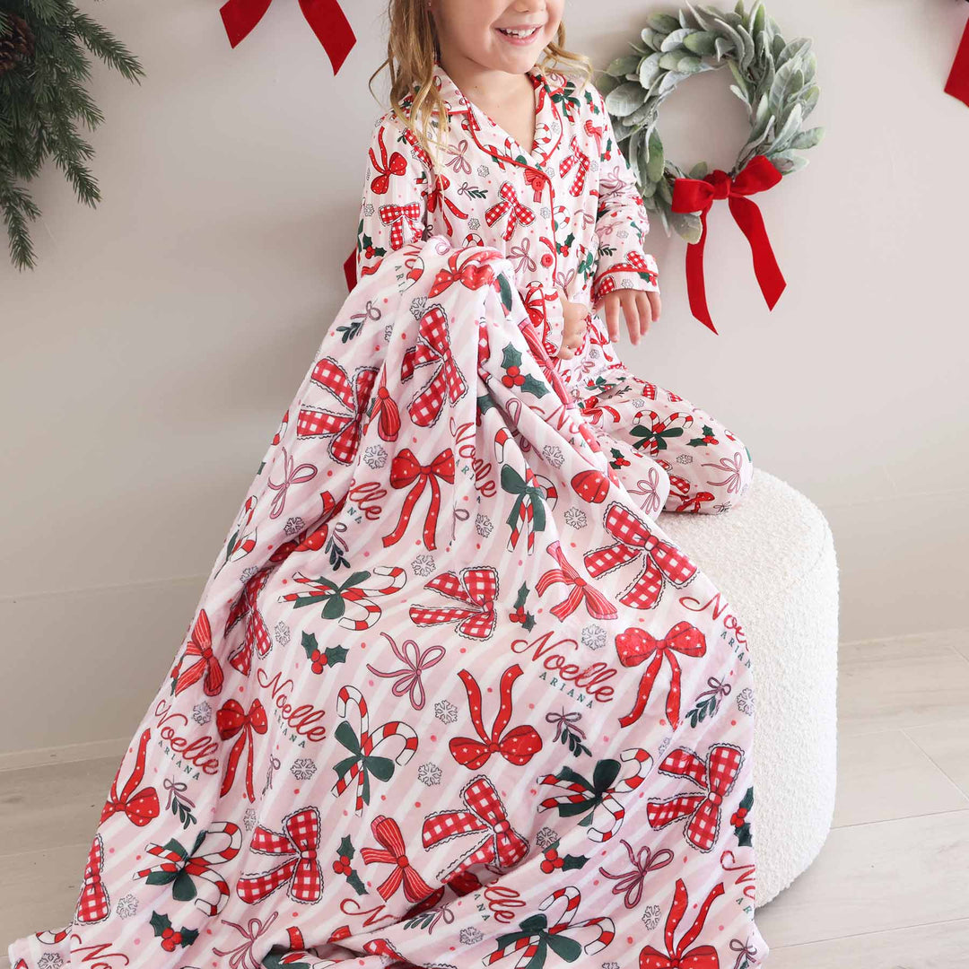 girly bow christmas blanket for girls personalized with name 