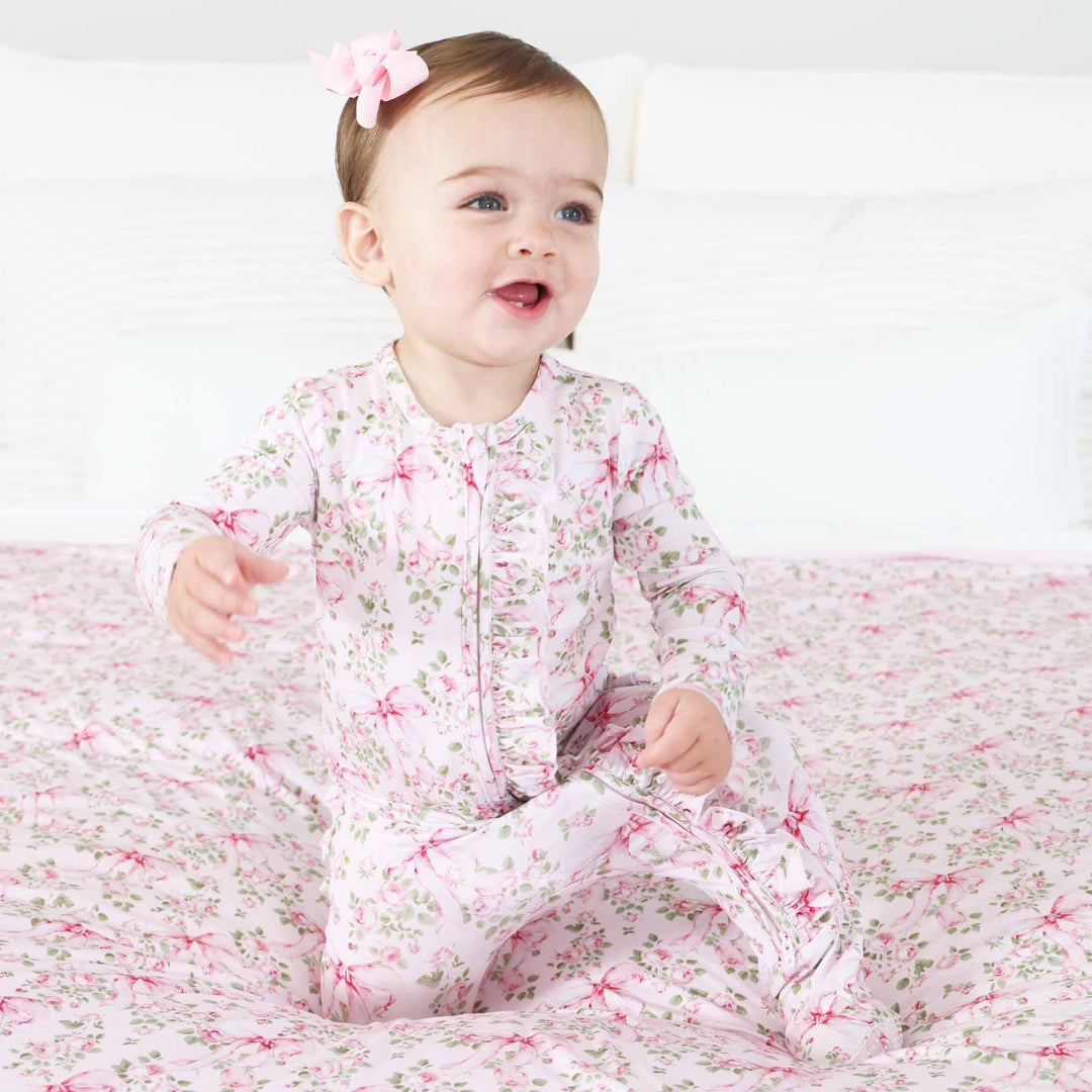 pink floral and bow ruffle zipper footie for girls 