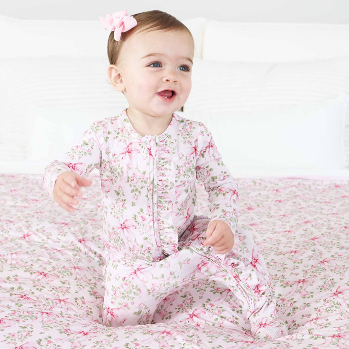 pink floral and bow ruffle zipper footie for girls 
