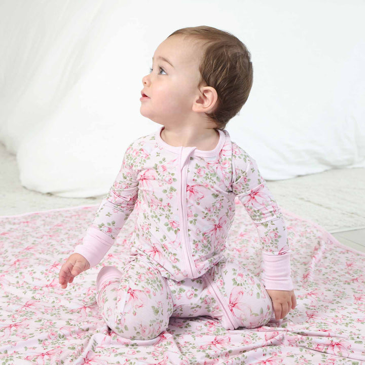pink and green bow and floral zip romper pajama for babies 