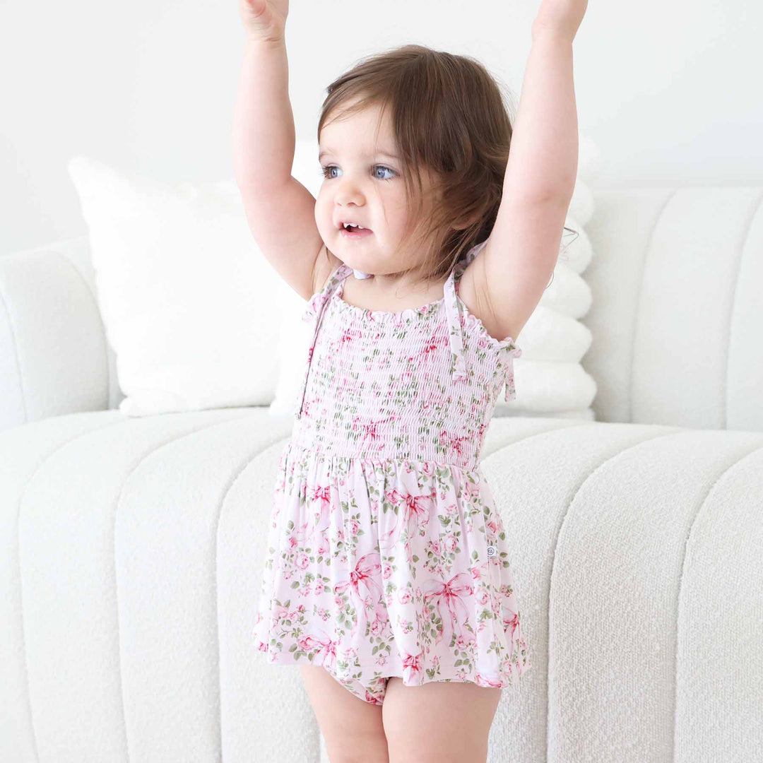 bows in bloom smocked sleeveless bodysuit for girls 