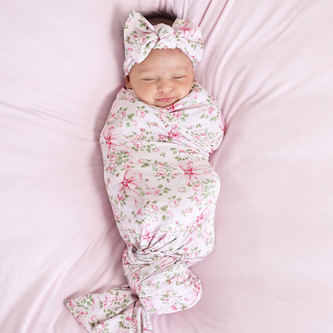flower and bow oversized swaddle blanket for girls 