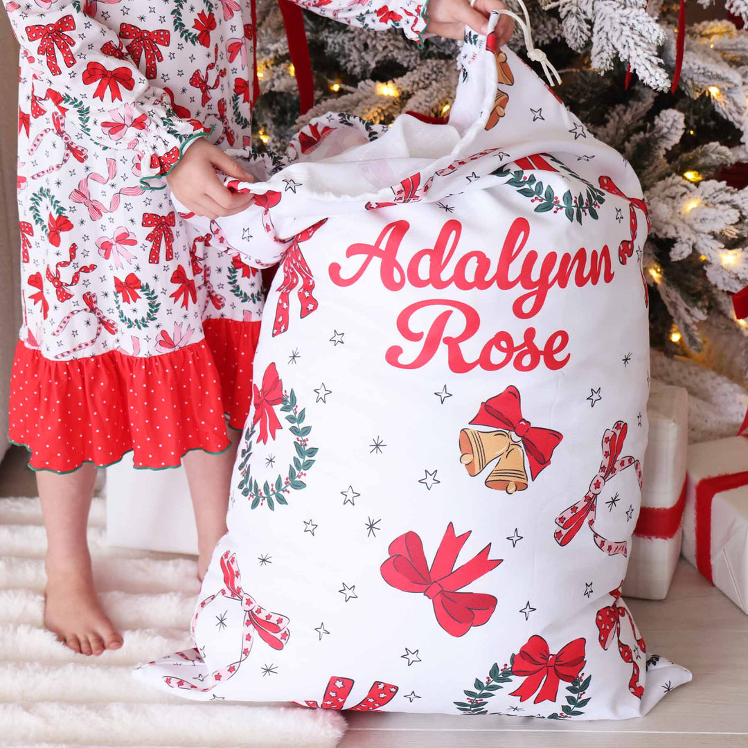 wrapped in a bow personalized santa sack for girls 