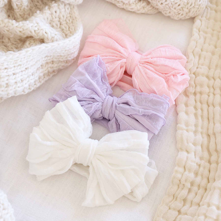 bright ruffle knit bows for babies 