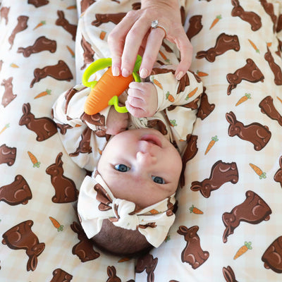 easter baby footie with chocolate bunnies 