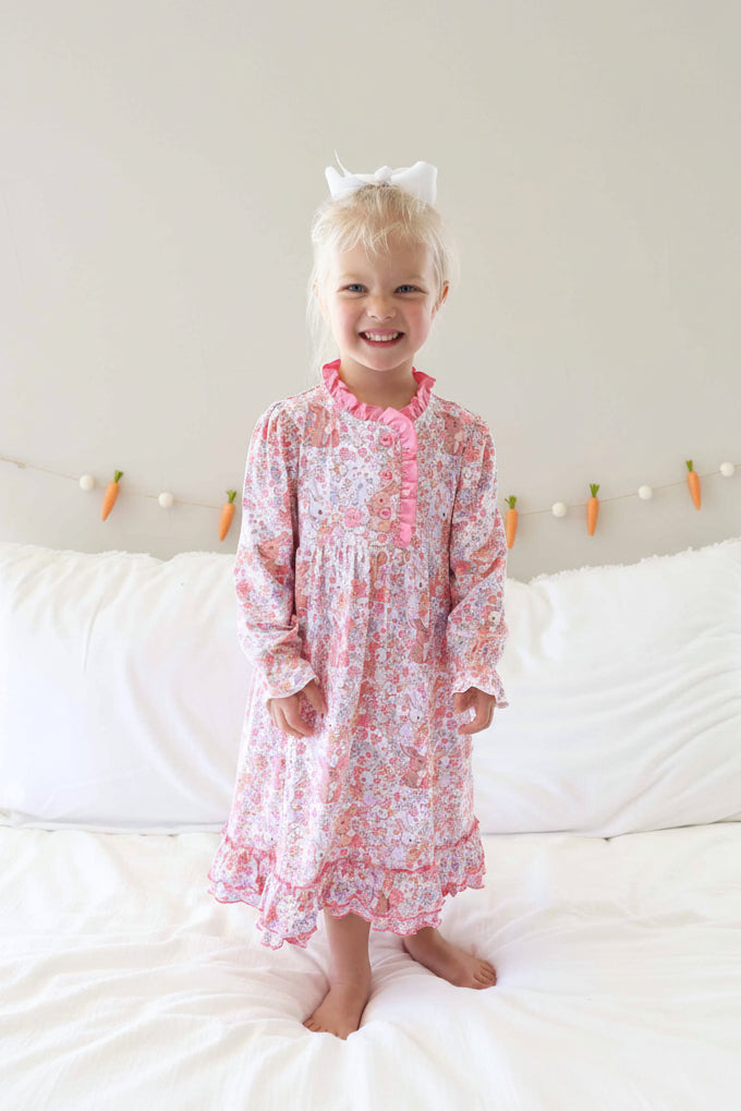 girl standing on bed in long sleeve midi length nightgown for girls in bunny blossoms 