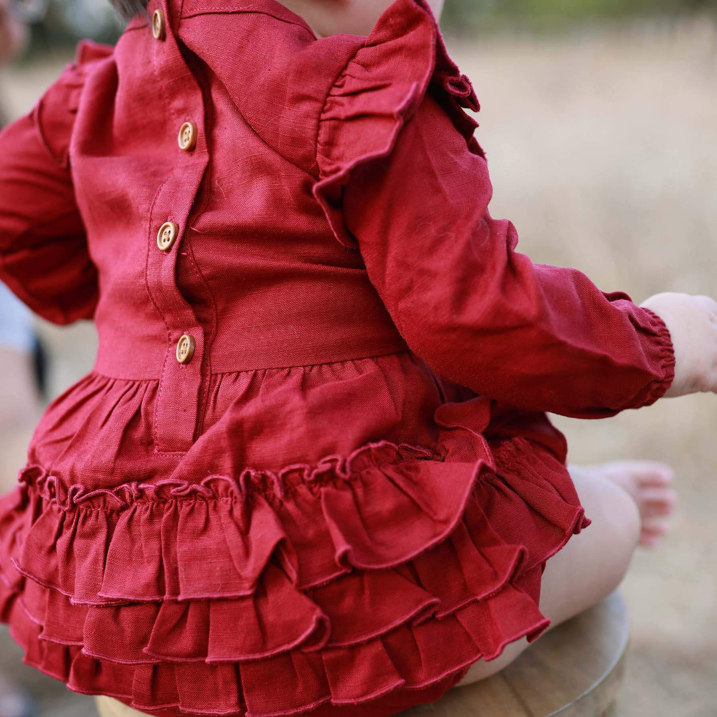 burgundy ruffle bubble romper for babies long sleeve with buttons 