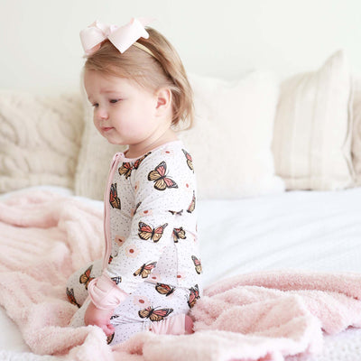 baby pajama romper with butterflies and flowers