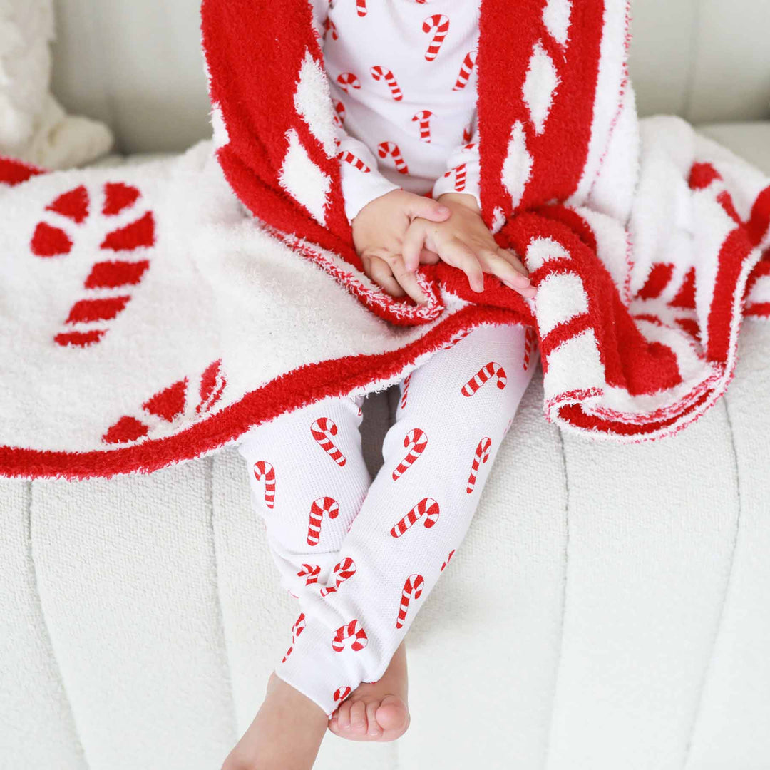 white pajamas for kids with candy canes 