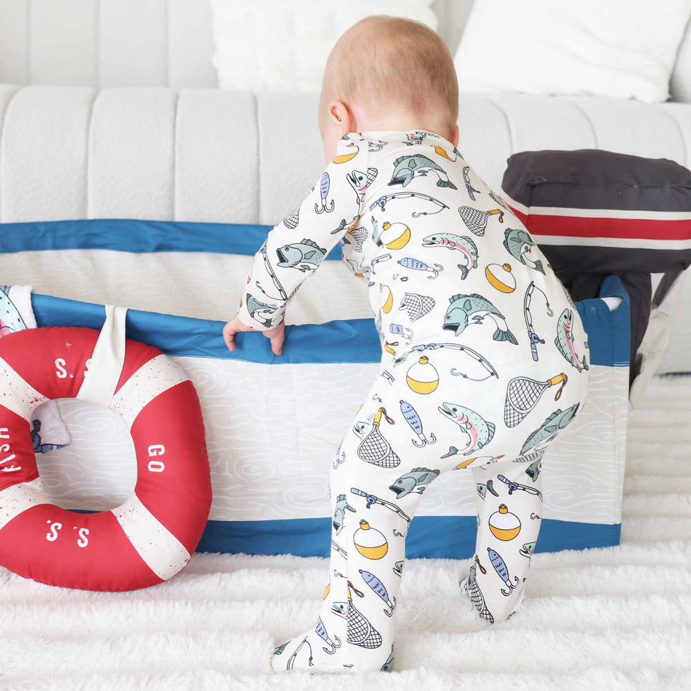 bass, fishing pole, bobber, and net zipper footie for babies 