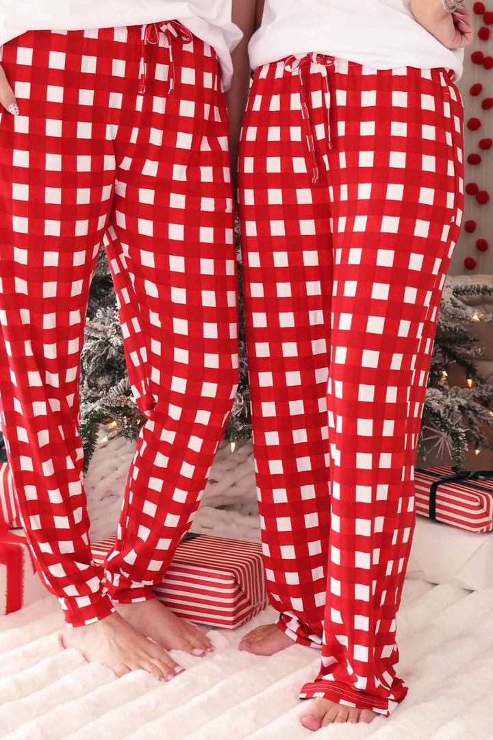 Mom and Father wearing red and white checkered pajama lounge pants featuring a relaxed fit, elastic waistband, and adjustable drawstring