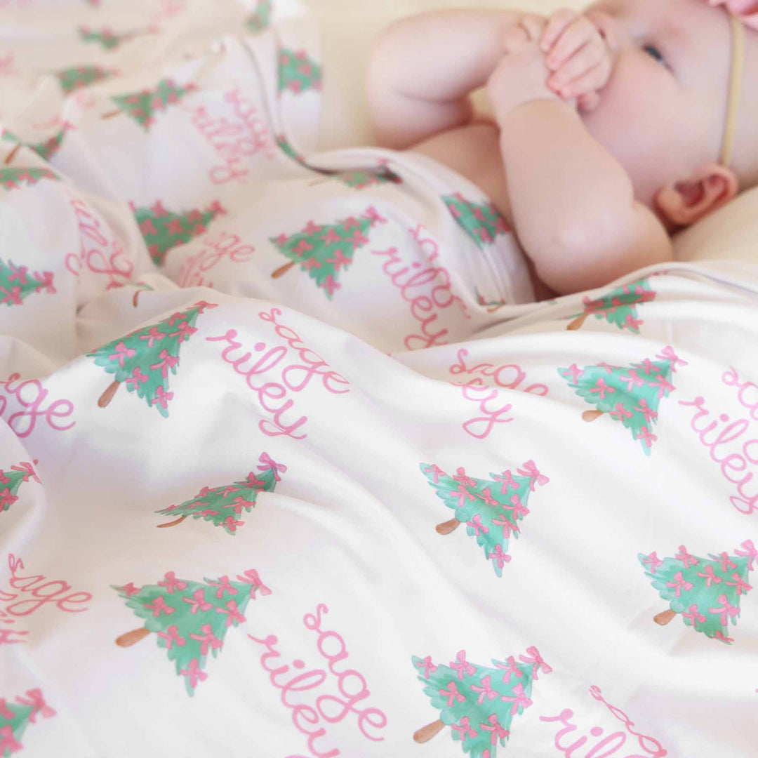 baby girl swaddle christmas trees with bows