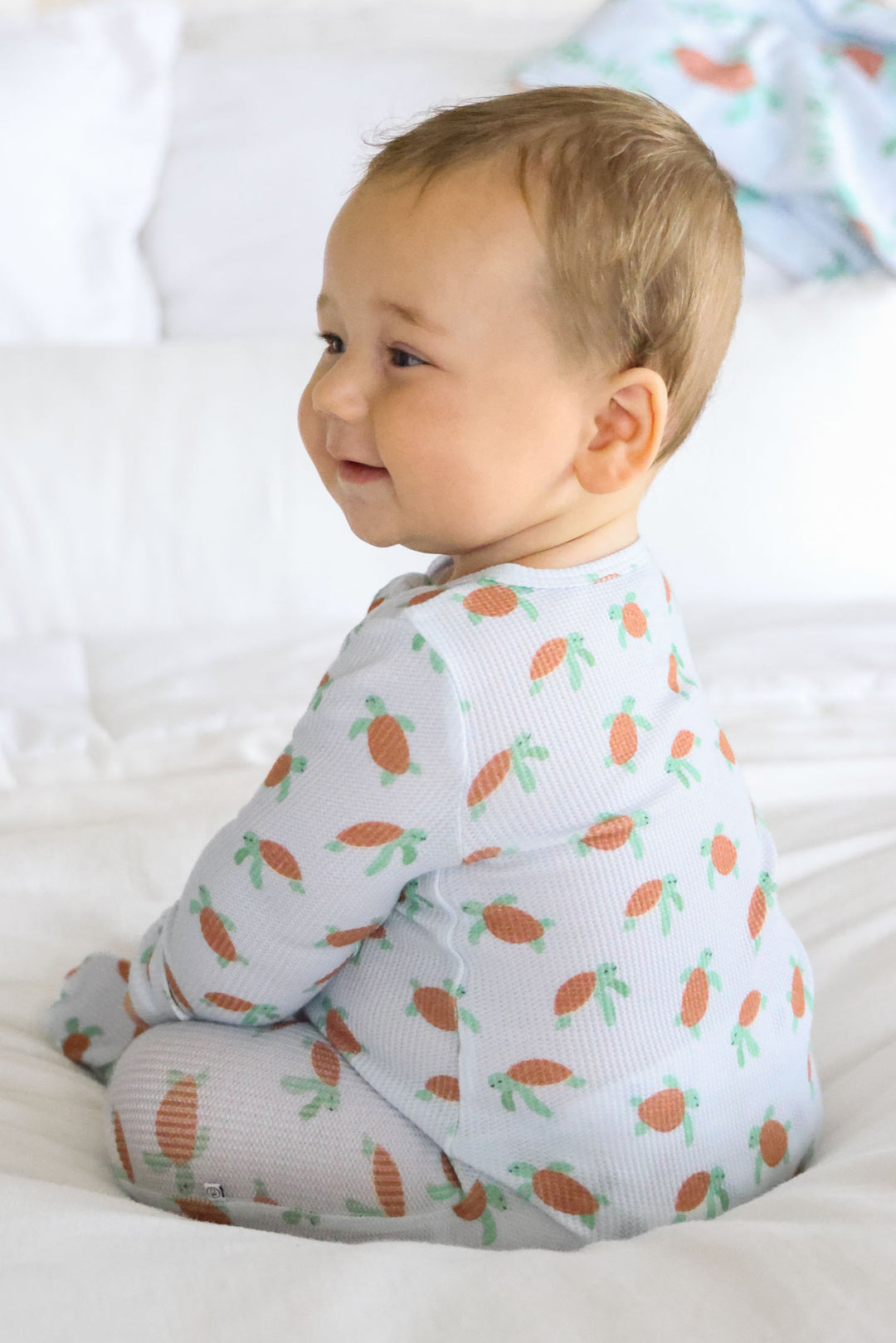 coastal cruisers zipper footie featuring turtle and ocean design on bamboo waffle