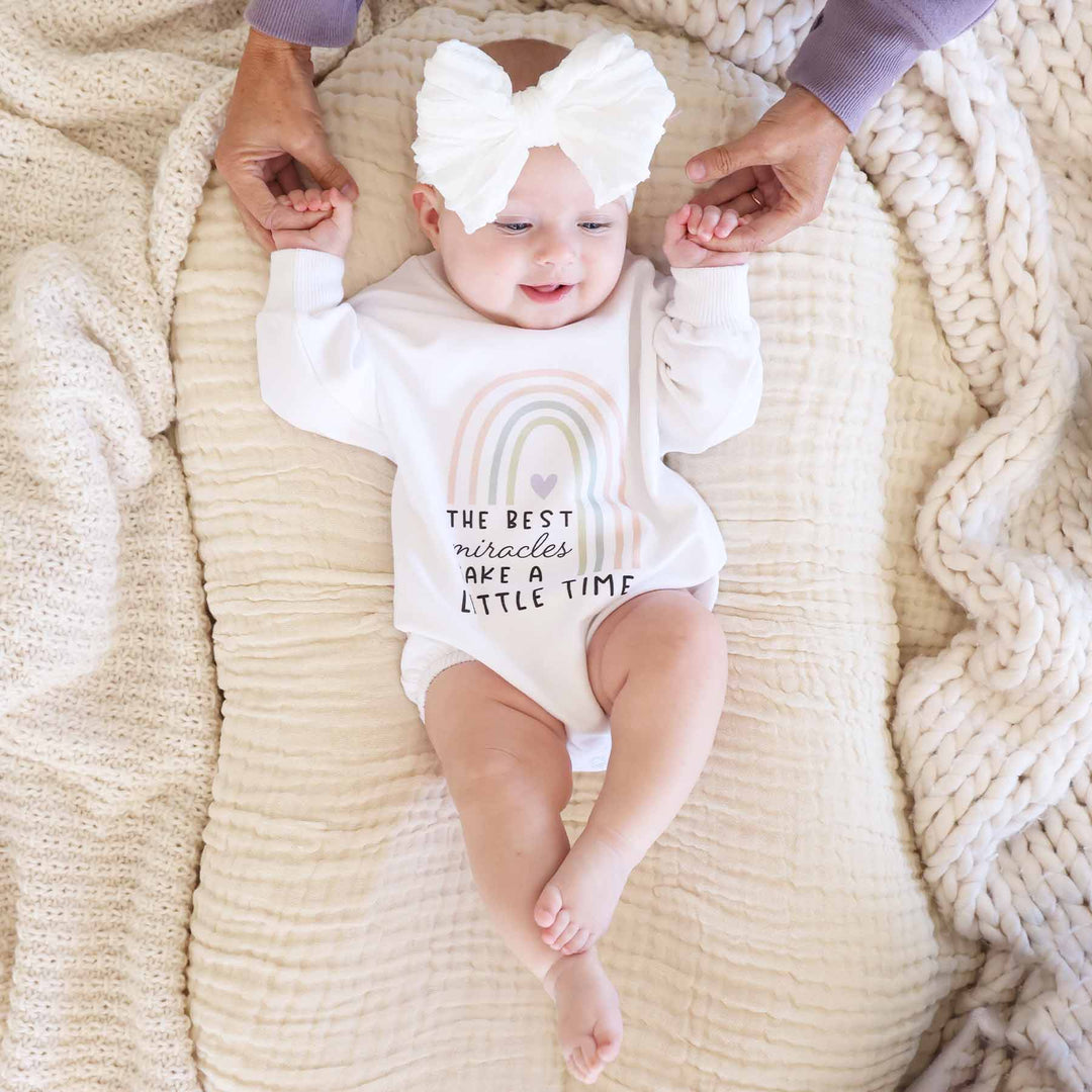 rainbow miracles take a little time sweatshirt bubble romper