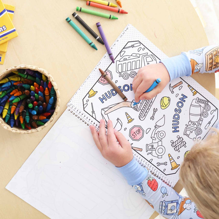 boy coloring construction themed coloring book that is personalized with name 