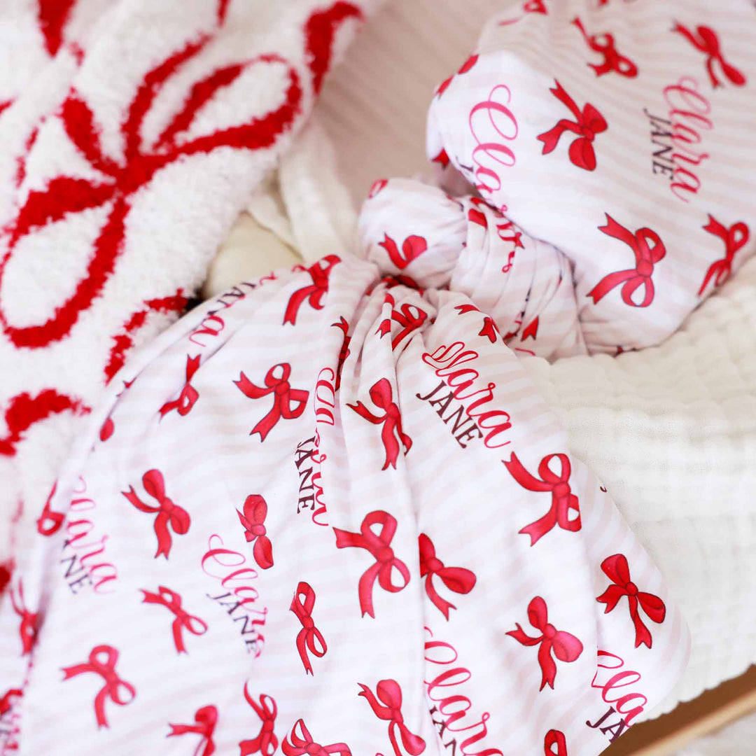 girly christmas bow personalized name swaddle for girls 