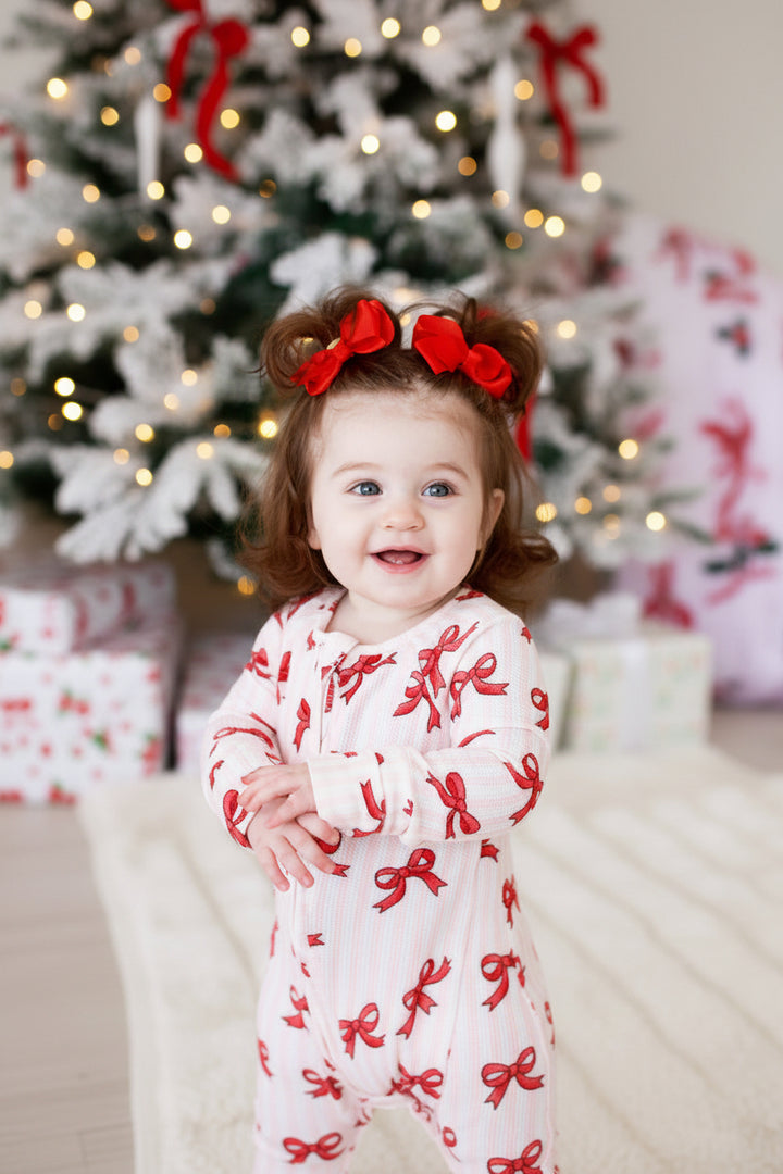 christmas baby zip romper bamboo waffle pink and white stripes with red bows 