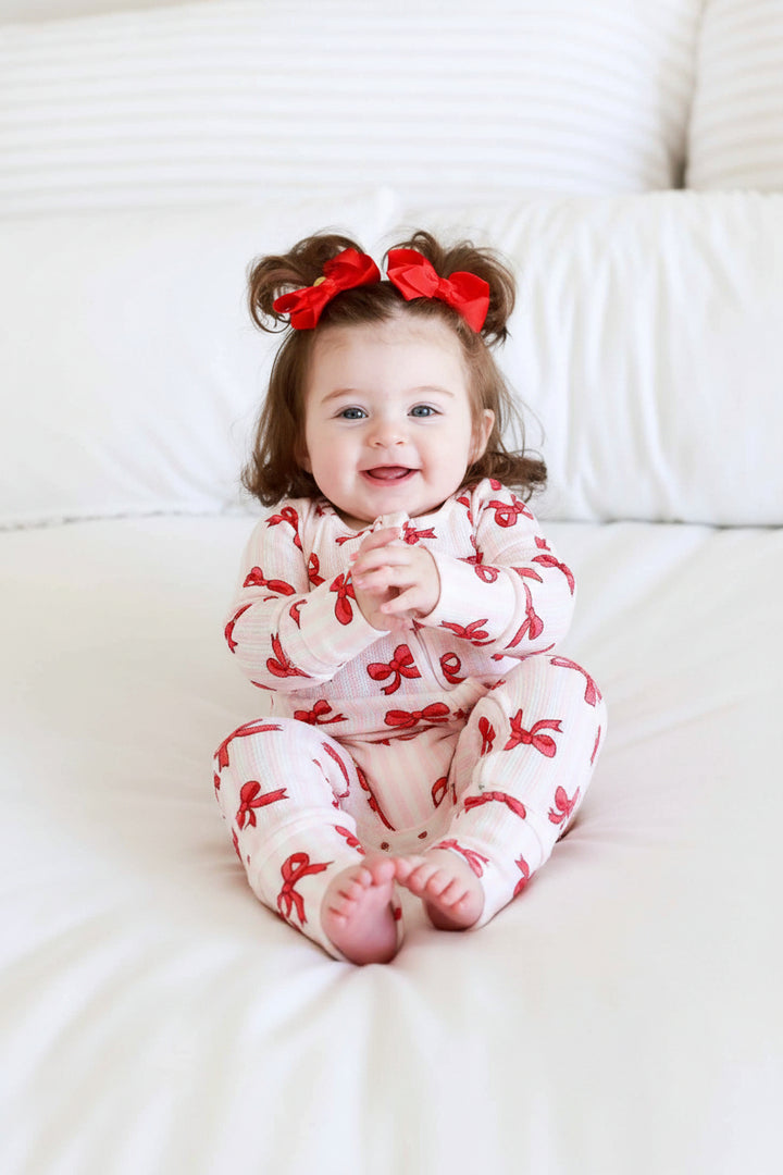 pink stripe and red bow bamboo waffle convertible zip romper pajama for babies and toddlers 