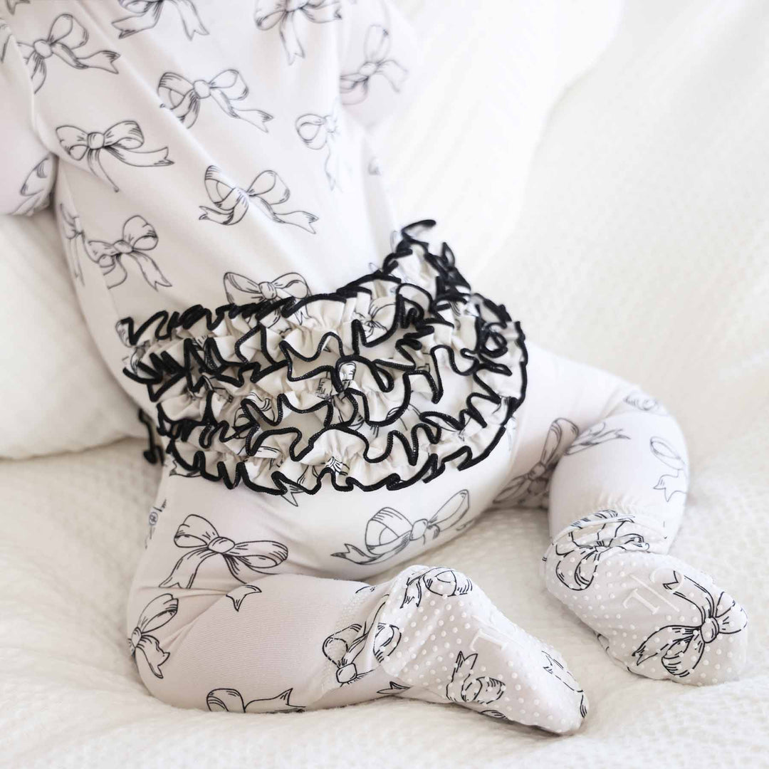 coquette cutie ruffle baby footie black and white bow