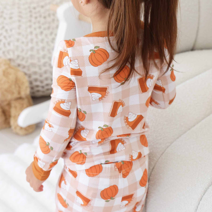 orange, tan and white gender neutral thanksgiving pajamas for kids