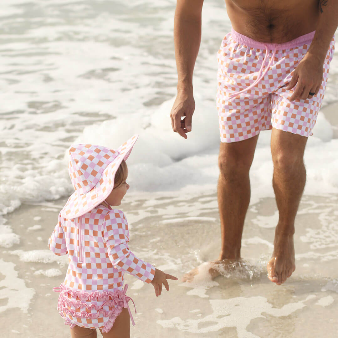 men's swim trunks pink and orange check