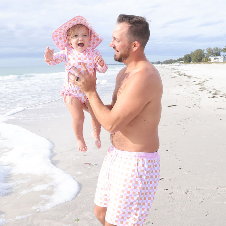 men's swim trunks pink and orange checkered print 