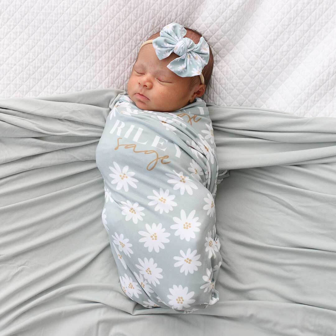 soft green daisy personalized swaddle blanket 