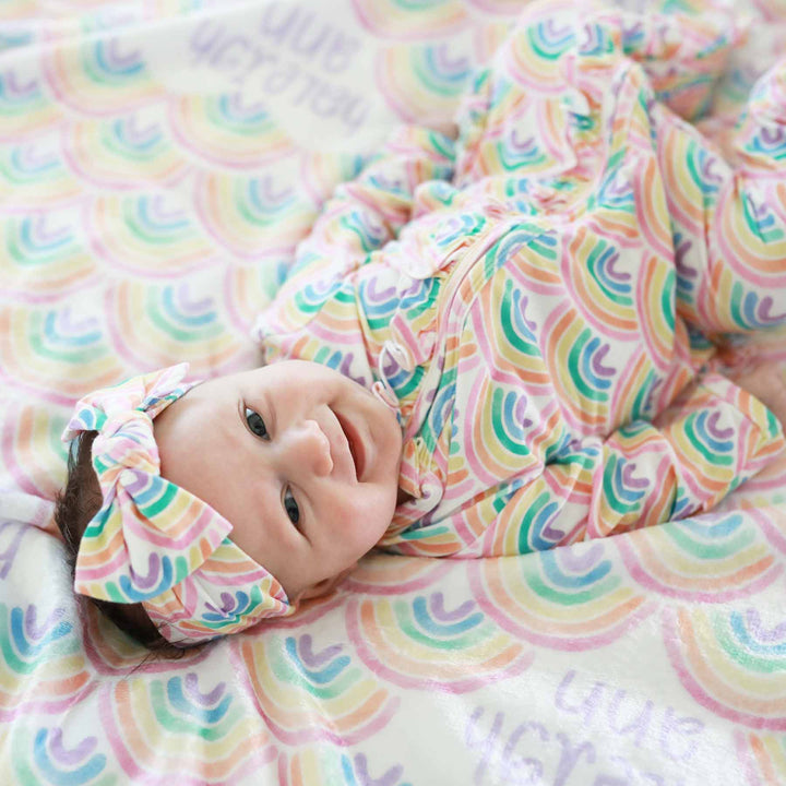 pastel rainbow ruffle zipper footie for babies