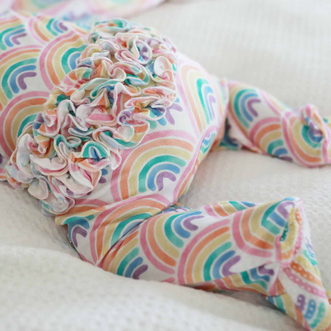 pastel rainbow ruffle zipper footie for babies 