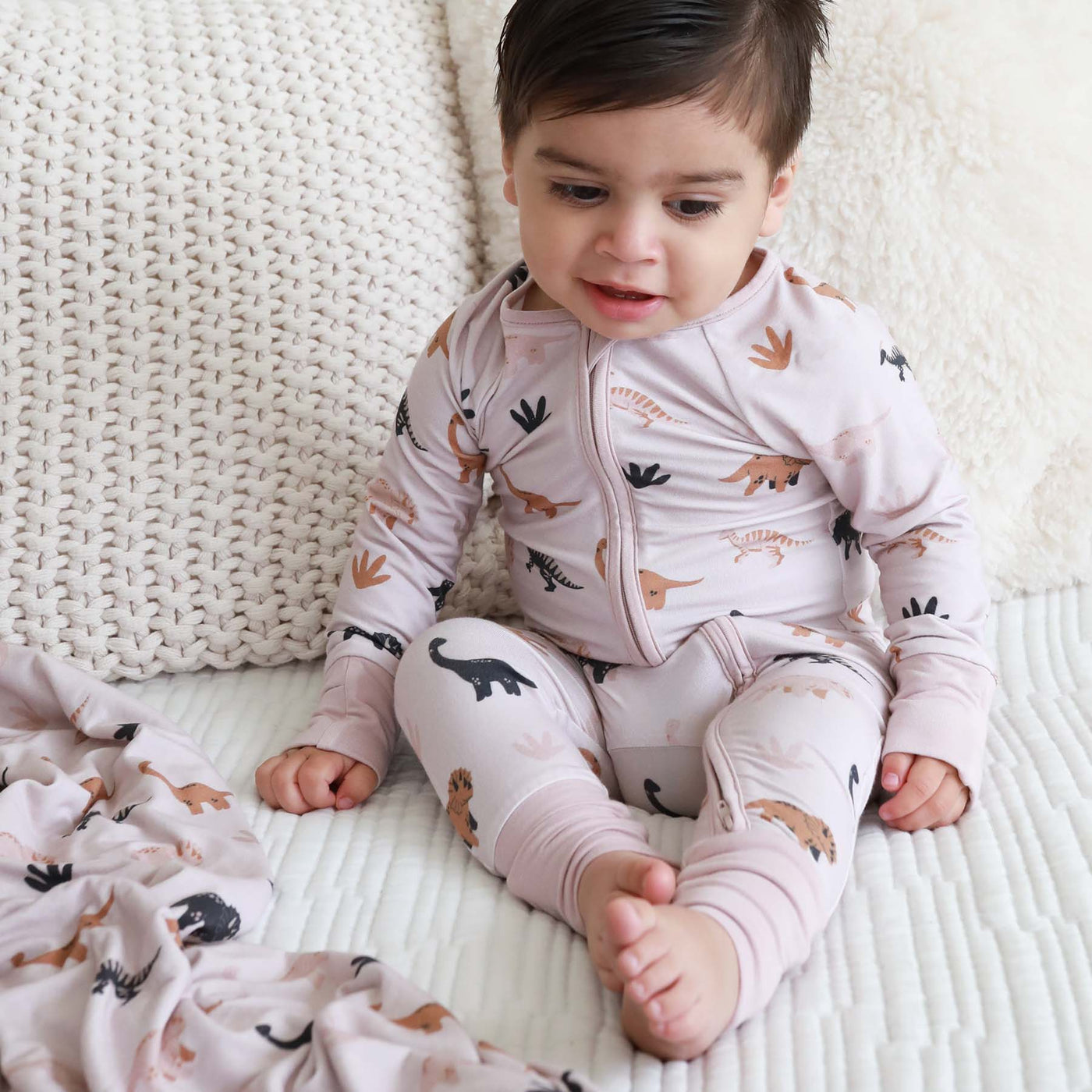 full length zipper pajamas for baby with neutral dinosaurs 