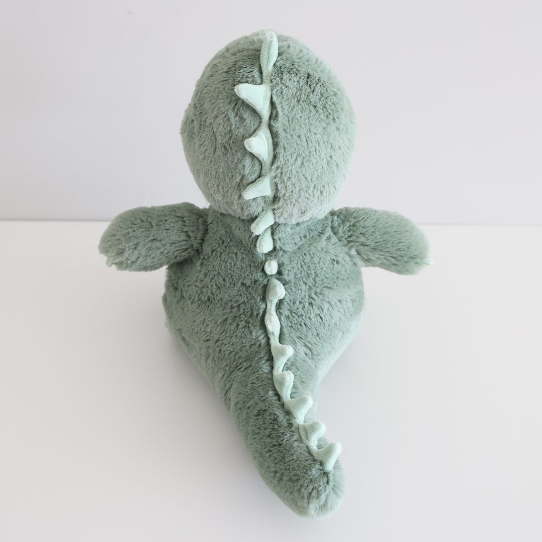 back view of green dinosaur stuffed animal
