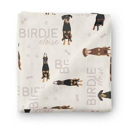 neutral personalized swaddle with dobermen 