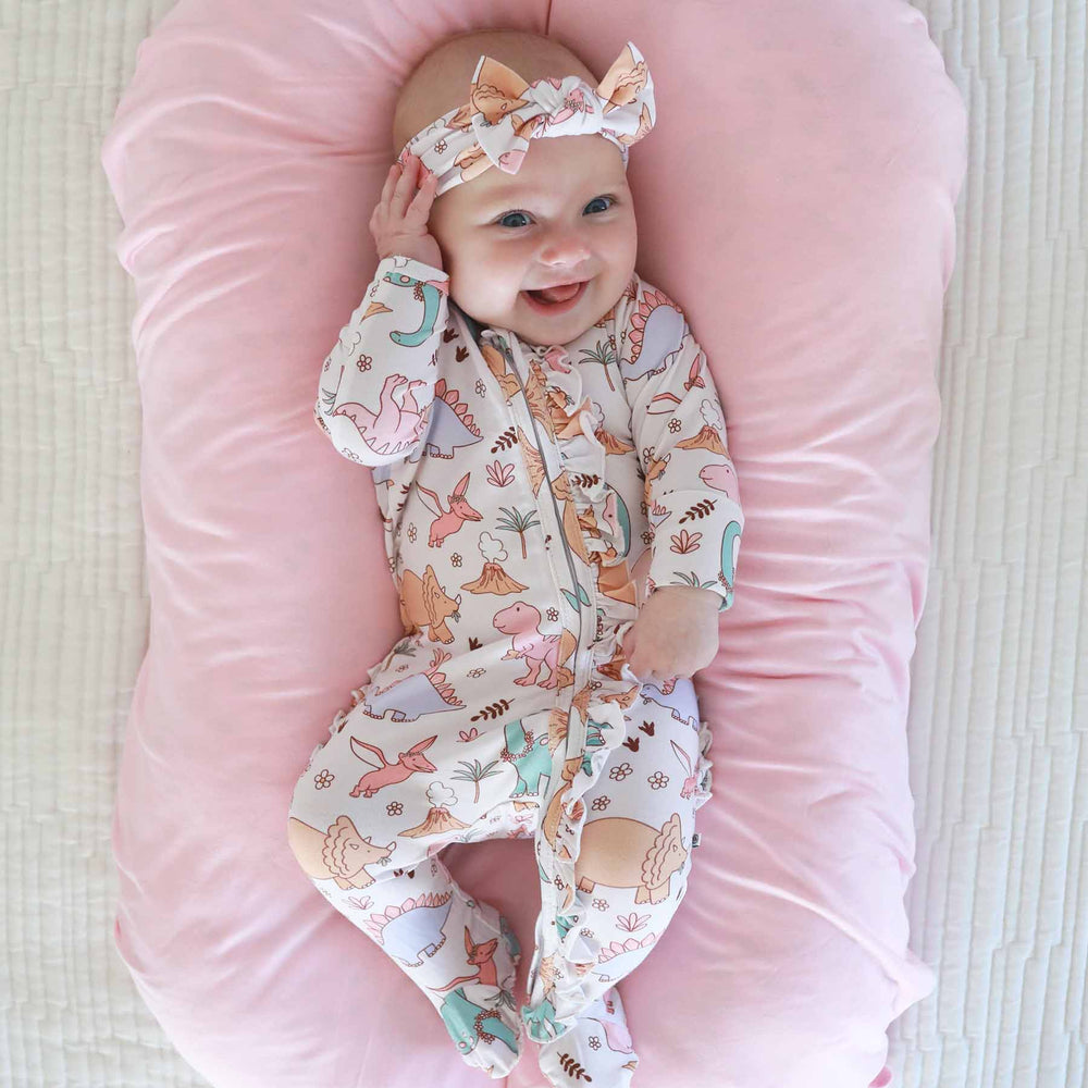 baby wearing Dolly's Dino head wrap