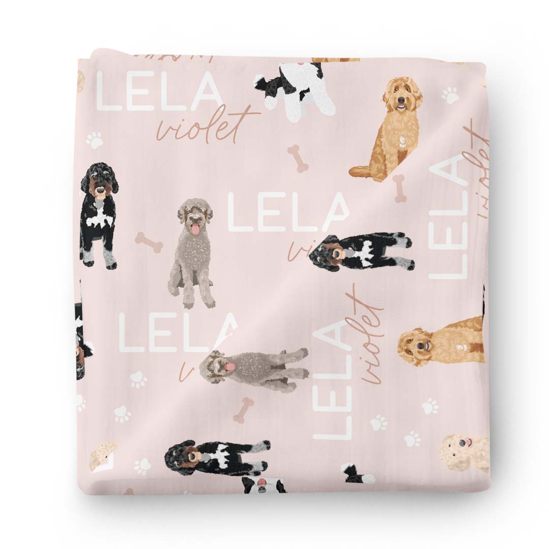 pink personalized swaddle blanket with doodles
