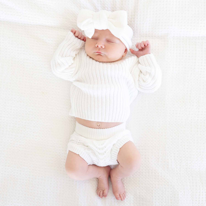 white sweater set for babies with lace bloomers