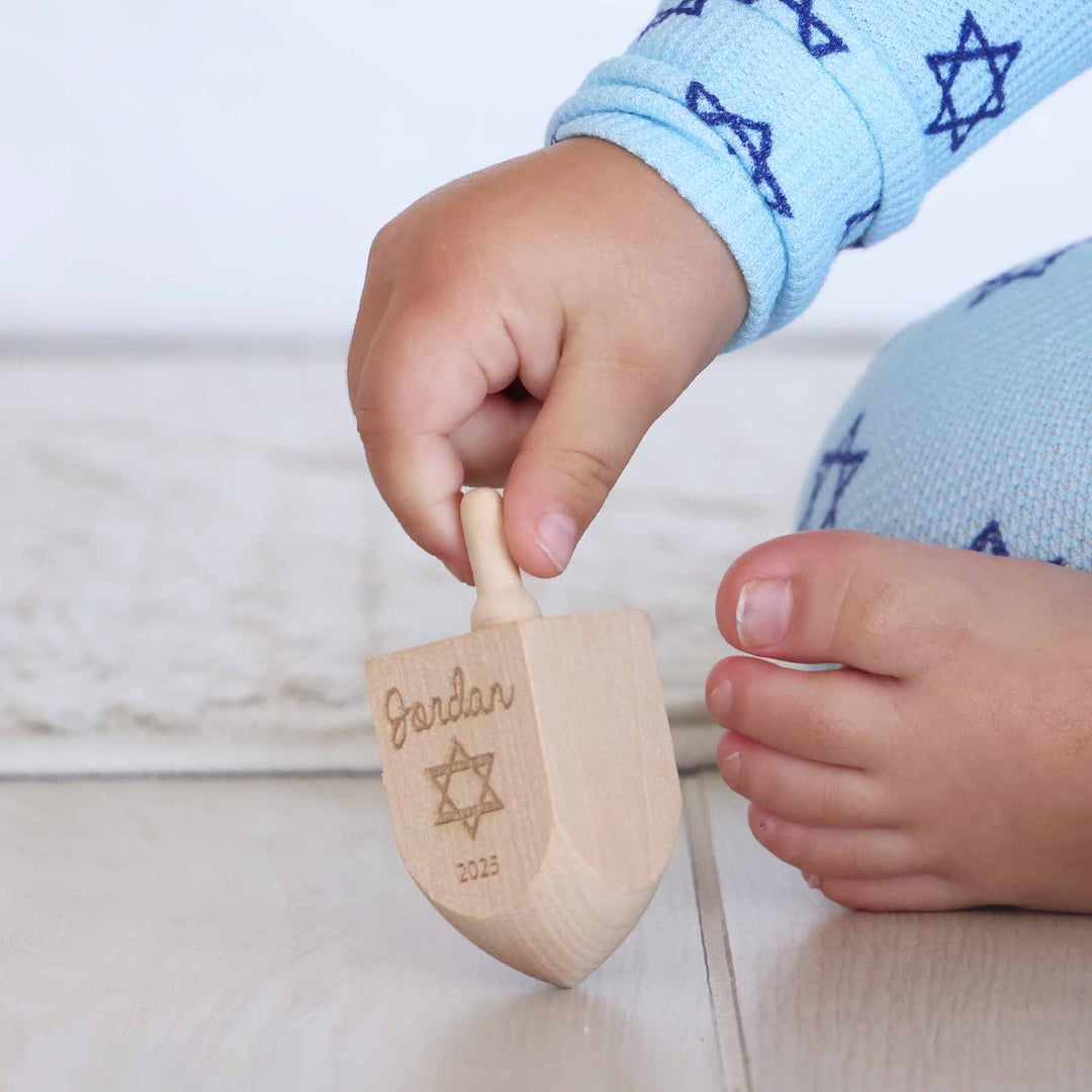 personalized hanukkah dreidel for kids with name, star of david and year 