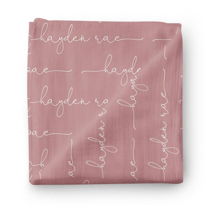 light dusty rose personalized baby name swaddle blanket