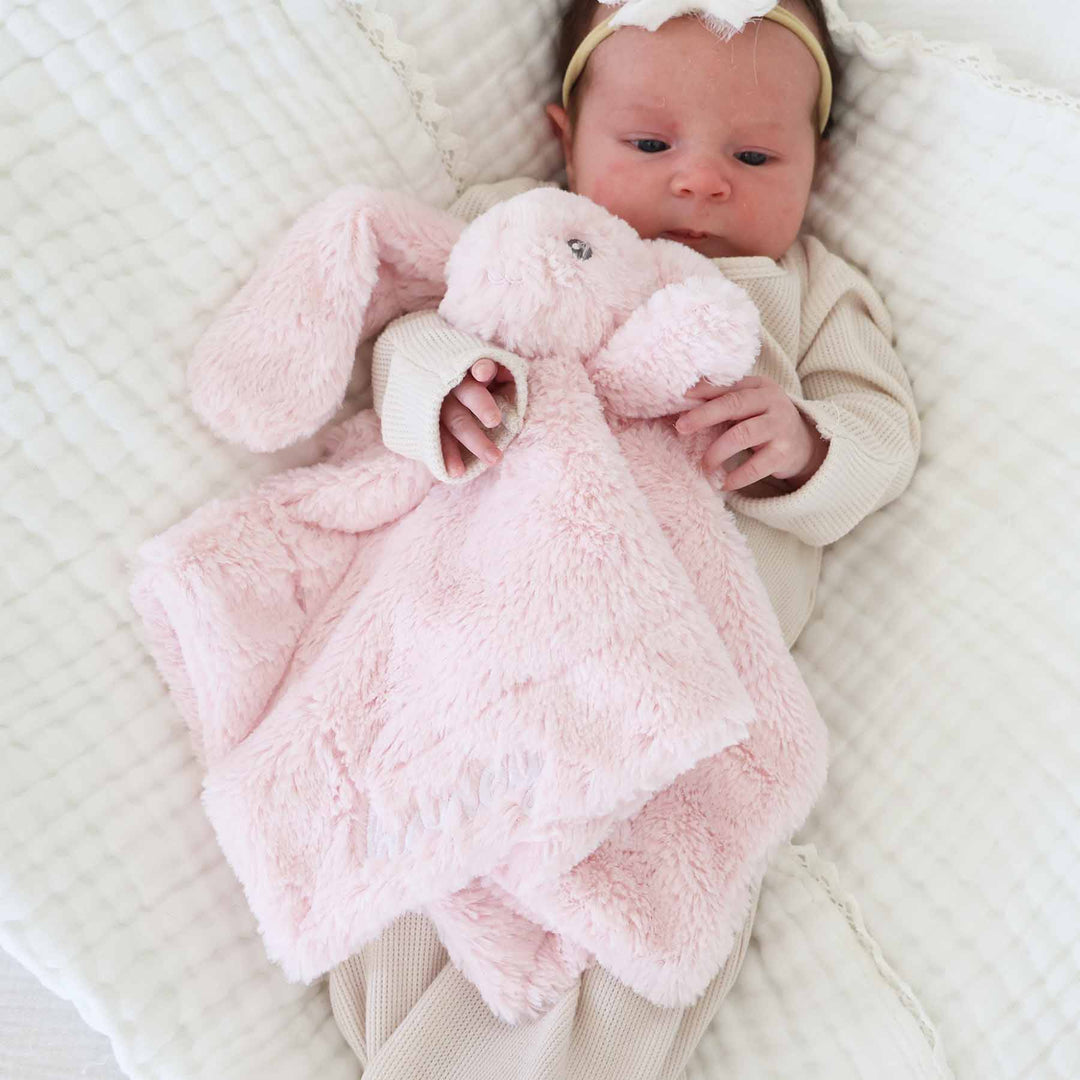pristine pink plush bunny lovey embroidered with name in white thread 