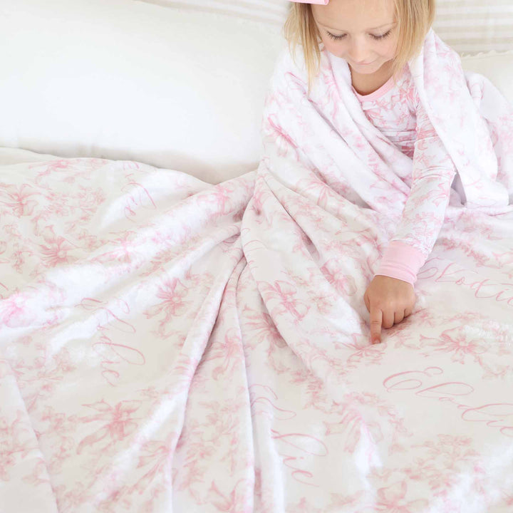 girls personalized name blanket white with pink bows and florals 