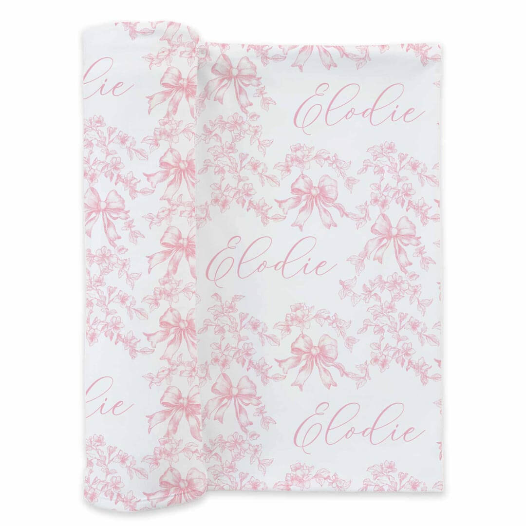 pink bow and floral on white personalized name swaddle or newborn girls 