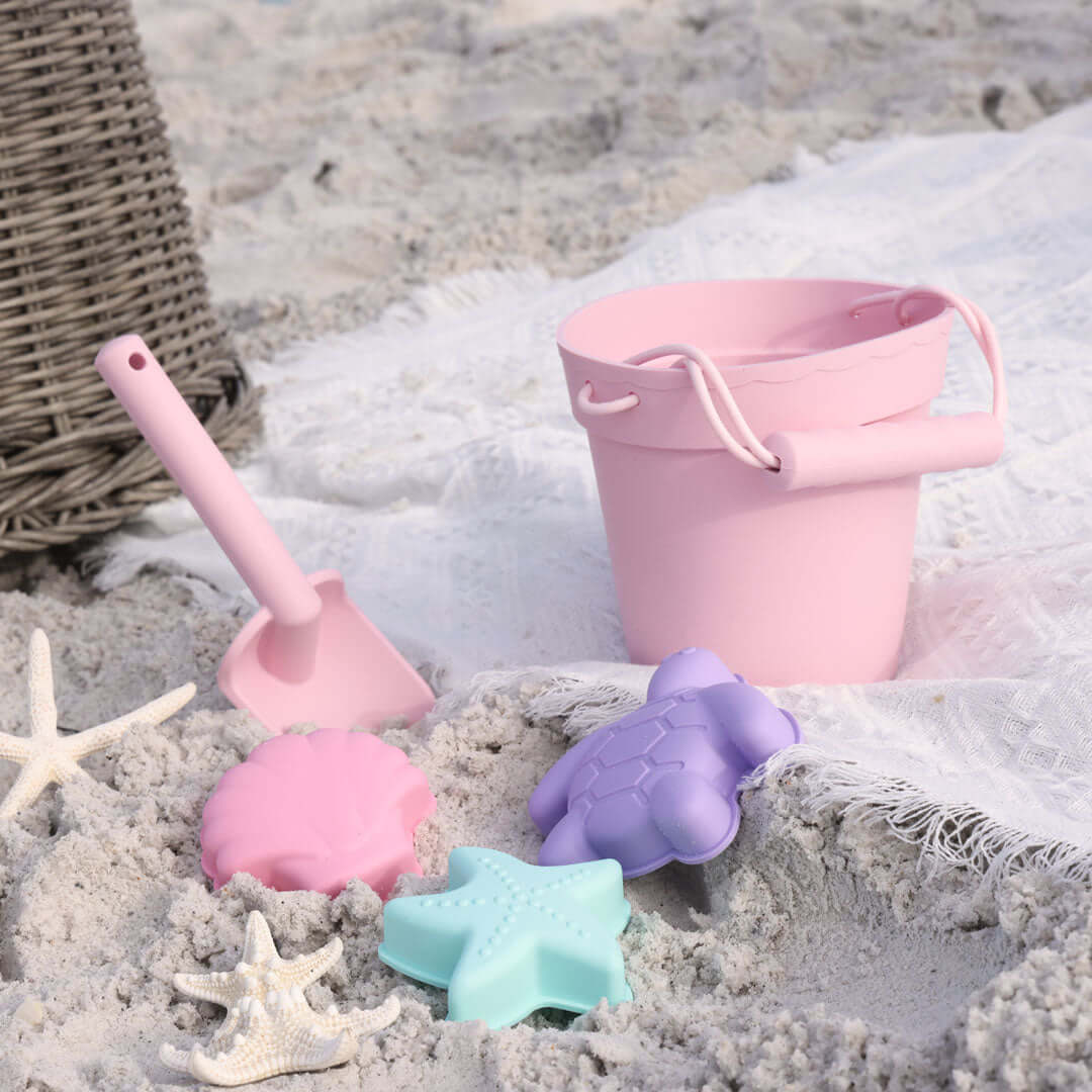 pink beach bucket with personalized shovel and molds 