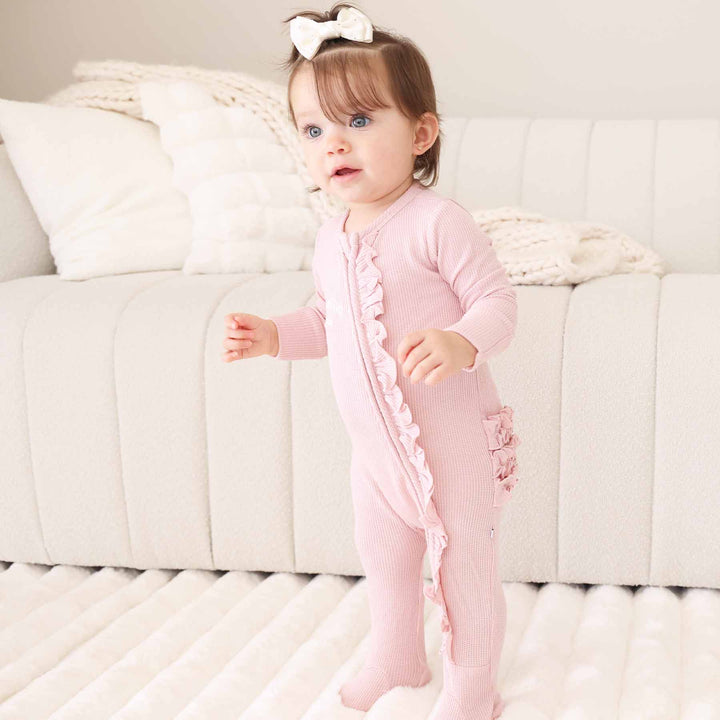 embroidered bamboo waffle zipper ruffle footie light pink lotus 