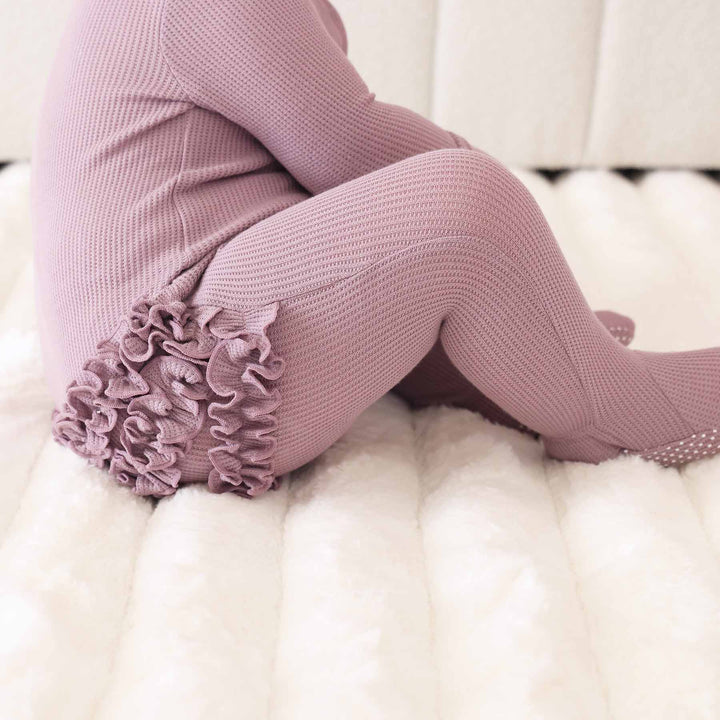 purple ruffle bottom embroidered zipper footie for girls 