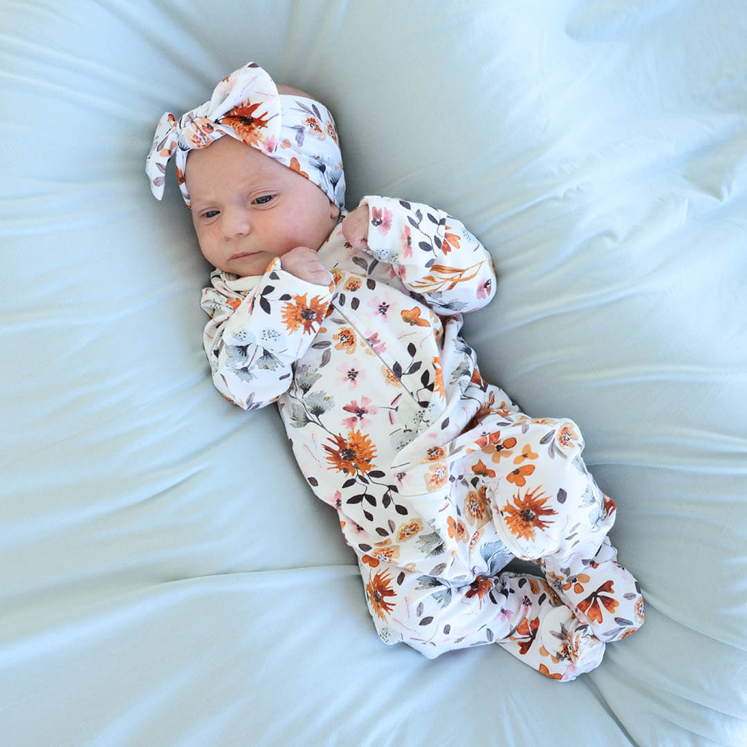 blue and orange floral footie for baby 