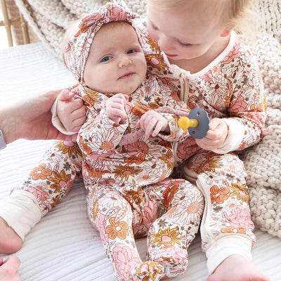 boho floral footie for babies pink and yellow