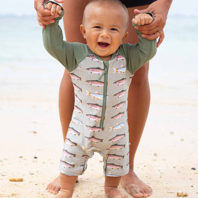 green swim romper for babies with trout 