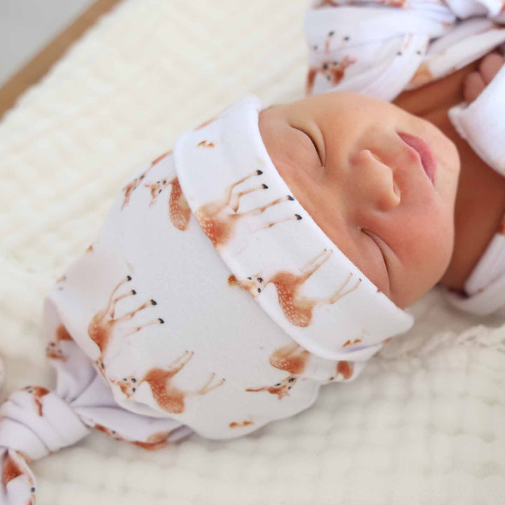 white knotted hat with fawns for newborns